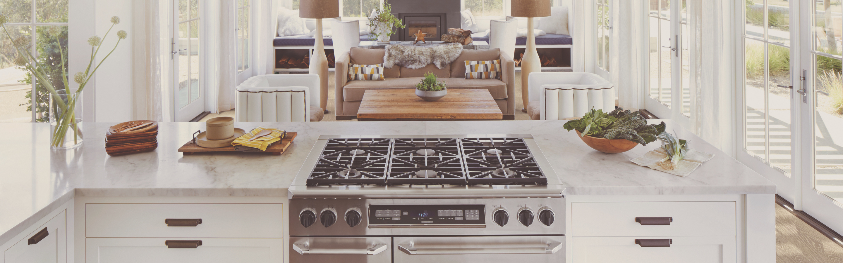 white countertops in a kitchen with wood-look floors